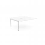 This image shows a clean and efficient office desk setup with two C-sense bench desks, connected by an add-on unit with scallop top. The white color adds a touch of modernity to the space. The desks measure 1600 x 800, making it suitable for two people to work comfortably.