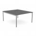 The picture shows a modern office bench desking with an open leg design and a scallop shaped top. It is 1400 x 800 in size and comes in a graphite and silver color.