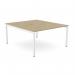 In the picture, the Edit Office Bench Desking C-sense features a sleek Urban Oak and white color combination. Its open leg design and scallop top provide a modern and spacious workspace. Perfect for a collaborative setting, this 2-person bench measures 1400 x 800.