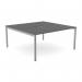 In this photo, you can see an open leg, scallop top office bench desking setup for two people. The sleek graphite color and silver accents give it a modern and professional look. The spacious 1600 x 800 size provides plenty of room for both individuals to work comfortably.