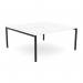 The Edit Office Bench Desking C-sense 2 Person Bench features a sleek, open leg design and a scalloped top, providing ample workspace for two individuals. The white and black color scheme adds a modern touch to any office space.