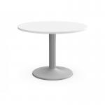A white round table with a silver cylindrical base, perfect for an office meeting.