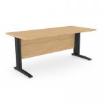 This picture features a spacious edit office with sleek, rectangular beech desks and sturdy metal legs. The desks measure 1800mm x 800mm and have a black finish on the metal legs.
