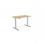 This photo shows an office set up with a Sit Stand and Height Adjustable desk. The desk has a rectangular Bamboo top with a silver frame, measuring 1200x700mm. This versatile desk allows for both sitting and standing positions, providing ergonomic benefits for the user. #OfficeDesk #SitStand #HeightAdjustable