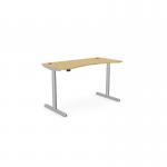 In the photo, there is an office setup with a sleek round sit stand desk. The desk has a curved bamboo top and a silver frame, adding a modern and eco-friendly touch. Its dimensions are 1400 x 700mm, making it spacious enough for work. The adjustable height feature allows for comfortable sitting or standing, promoting a healthier work environment.