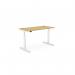 This photograph features an edit office setup, showcasing sit-stand and height adjustable desks in a round and rectangular shape. The desks have a beautiful bamboo top and a sleek white frame, measuring 1400 x 700mm. This modern and functional workspace is perfect for any professional setting.