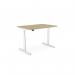 The Edit Office Sit Stand and Height Adjustable Desks RoundE Height Adjust Desk features a round, modern design with a durable white frame and sleek, urban oak top. The 1400 x 800mm size provides ample workspace, and the adjustable height capabilities make it versatile for any office setting.