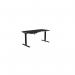 This photo shows a modern and practical office space with Kay top height adjustable desks. The desks have white legs and a sleek black top, and one is equipped with a zoom function. The size is 1600 x 800 and it is designed for a left-handed user.