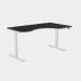 In the photo, there is a modern and functional office space featuring a sleek black desk with curved edges and adjustable height options. The legs are a crisp white color, adding a touch of contrast. The width of the desk is 1600 mm and the depth is 800 mm, making it spacious for work. The desk is designed for right-handed use and has a Zoom function for better visibility.