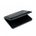 The picture shows a black COLOP stamp pad with the words COLOP MICRO 2 printed on it. It appears to be compact in size and has a smooth and matte texture. The pad is surrounded by a plastic casing with the COLOP logo on it.