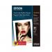 The photo shows a pack of 50 sheets of Epson Speciality Paper, specifically the Archival Matte Paper in A3+ size. The paper has a weight of 189gsm and is labeled with the brand name and product name. The paper appears to have a smooth, matte finish and is likely suitable for archival purposes.