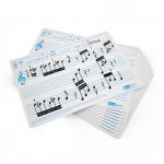 This image shows a pack of 35 A4-size music ruled drywipe boards from Eastpoint Lapboards. The boards are white with thin black grid lines and have a glossy finish. Each board has a smooth surface that allows for easy writing and erasing. The pack is neatly packaged and ready for use in a classroom or office setting.