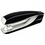 The photo captures a sleek and stylish ACCO Brands stapler from their Leitz WOW collection. Made of durable metal, it is designed to effortlessly staple up to 40 sheets of paper. The deep black color adds a touch of sophistication to any desk.