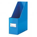 The photograph showcases a blue Leitz Click & Store Magazine File from ACCO Brands, displayed on a bookshelf or magazine rack. The design features a sleek, modern look with sharp corners and a smooth finish. The file clearly has a sturdy construction, as it is able to hold multiple magazines without bending or collapsing. The vibrant blue color adds a pop of color to the overall aesthetic, making it a stylish and functional addition to any workspace or home office. The file is labeled with the corresponding brand and product name, adding to the professional presentation.