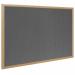 The photograph shows a Bi-Silque Noticeboard from Bi-Offices Earth-It collection. The noticeboard features a grey felt surface and an oak wood frame, measuring 1200x900mm.