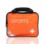 In the picture, there is a Crest Medical First Aid Blue Dot Medium Sports First Aid Kit in an orange bag with the label 300002PS 60143WC. The bag is filled with various medical supplies and has a cross symbol on it. The kit appears to be compact and portable, perfect for handling minor sports injuries on the go.