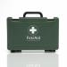 The photo shows a compact blue and green first aid kit from Crest Medical with the BS 8599-1 (2019) certification. Its contents include essential travel supplies for emergencies on the go.