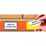 The photo showcases the vibrant yellow Beaverswood Supply Ltd warehouse signage on a large sign. In the foreground, there are clear front ticket pouches made of magnetic PVC, all neatly organized on warehouse shelves and racks. The pouches are measured at 30mm in height and 100mm in width. The overall image exudes a sense of organization and efficiency in a warehouse setting.
