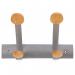 This photograph features an Alba wall coat hook with 2 double pegs in silver grey and light wood. The coat rack is sleek and modern, adding functional and stylish storage to any space.