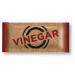 The image shows a pack of 200 vinegar sachets labeled as Condiments ValueX. The sachets are neatly arranged in rows, each one bearing the brands logo and all the necessary information. The vinegar inside is a golden brown color, giving a sense of freshness and quality. Overall, the image exudes simplicity and convenience for everyday use.
