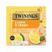 A refreshing cup of Twinings Fruit And Herbal Tea Twinings Lemon & Ginger is captured in this photo, featuring 80 loose bags of the flavorful blend. The vibrant colors of the lemon and ginger pieces pop against the black background, making for an enticing visual treat.