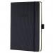 The photograph features a sleek black Sigel Conceptum Diary for the year 2026. The diary has an A5 size and features a day per page layout. The cover is a sturdy hardcover material. The overall design is professional and modern.