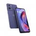 The photograph shows a sleek, lavender Motorola mobile phone with a large 6.67 inch screen and powerful MediaTek Helio G81 processor. It has 2GB of RAM and 64GB of storage, running on the latest Android 14 Go Edition. The phone has a modern and fresh look, perfect for tech-savvy users.