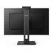 The photo shows the sleek Philips B Line 243B1JH monitor, measuring 23.8 inches with a Full HD resolution of 1920 x 1080 pixels. It features multiple ports, including HDMI, DisplayPort, and USB, and has a crisp LED display. The monitors design is modern and stylish, perfect for any workspace.