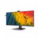 The photograph displays a 40-inch Philips 5000 Series monitor with a sleek design and a high-resolution 3440 x 1440 pixel display. The monitor features a dual quad HD IPS panel, HDMI and DisplayPort connectivity, and a USB-C docking option. A built-in webcam is also visible, providing convenient video conferencing capabilities.