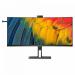 The photo features a sleek and modern Philips 6000 Series monitor with a stunning 5K Ultra HD IPS panel. The 39.7 inch screen boasts a resolution of 5120 x 2160 pixels and supports HDR10 technology. With Thunderbolt 4, HDMI, DisplayPort, and a docking feature, this monitor is versatile and practical for any workspace.