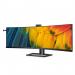 The image shows a sleek and modern Philips Monitor, part of the 6000 series. The monitor is 44.5 inches in size, displaying images and videos in stunning 5120 x 1440 pixel resolution. The UltraWide screen features a Dual Quad HD VA Panel, providing vibrant and lifelike colors. With HDMI, DisplayPort, and USB-C ports, this monitor offers versatile connectivity options. It also includes a built-in webcam, making it perfect for virtual meetings and conferences.