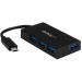 In this photo, we see a StarTech USB Printer Cable A to B and Extensions connected to a StarTech 4 Port USB-C Hub. The USB-C hub features 4 USB-A ports, providing convenient access to multiple devices. The cables are neatly organized, with a sleek and modern design.