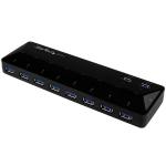 The photograph shows a sleek and modern StarTech 10 Port USB 3.0 Hub with 2 x 1.5A Ports. The hub is made of high-quality black plastic with a glossy finish. It features 10 ports in total, with 8 USB 3.0 ports and 2 dedicated 1.5A ports for quick charging. The ports are evenly spaced out on the hub, allowing for easy access and organization of devices. The StarTech logo is prominently displayed on the top of the hub. Overall, the hub has a compact and efficient design, making it a great addition to any workspace.