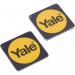 In the photograph, the Yale Locks Security Equipment is shown featuring two phone tag devices in a twin pack. Both devices are compatible with the Conexis and Keyless Connected systems. The phone tags are sleek and modern in design, with a black finish and RFID technology. The pack includes all necessary equipment to easily install the devices on any compatible Yale lock.