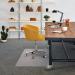 This photo features a sleek, transparent Cleartex rectangular chair mat made of durable PVC material. The mat measures 1500x1200x2.2mm and is specifically designed for carpets. The Clear 1115225EV FL74112 adds a touch of modernity to any office space.