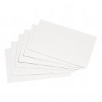 The photo showcases a stack of 5 Star Office Record Cards placed neatly on a desk. These 5x3 inch cards feature a classic blank white design and come in a pack of 100. Each card is evenly spaced and aligned, perfect for organizing information and keeping important records. The 5 Star Card Indexing system is ideal for any office or workplace setting, providing a simple and efficient way to manage and store important data.