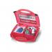 The image shows multiple 5 Star Facilities Burns Kits and Dispensers lined up on a shelf. Each kit is fully stocked with all the necessary items for treating burns, including bandages, gauze, and burn gel. The bright red packaging stands out and conveys a sense of importance and urgency.
