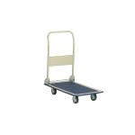 The photo shows GPC Platform Trucks GPC Folding Lightweight Trolley in bright yellow color, with four wheels and a long, flat base for transporting bulky items. The trolleys handle is folded down and the truck is compactly folded for storage.