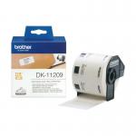The picture shows three Brother paper labels in the DK11209 series. The labels are small and rectangular, with a white background and black text. The label in the center reads Address Labels while the other two on the sides have no text but a blank white space. The labels have a glossy finish and are attached to a roll.