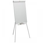 The photograph shows a high-quality flipchart easel with a clean and minimalist design. The tripod stand is made from durable materials and features a sleek black finish. The pad holder is adjustable and securely holds the notepad in place. The easel has a large surface for displaying presentations or brainstorming ideas. The sleek, modern design is complemented by the professional-looking Nobo branding.