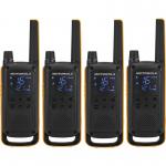 The photo shows four Motorola two way radios from the TLKR T82 Extreme series. The sleek black devices have an LCD display and a push-to-talk button, with a range of up to 10km and 16 channels. The pack comes with rechargeable batteries and a charging dock.
