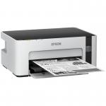The photo shows a sleek Epson EcoTank ET-M1120 A4 Mono Inkjet Printer. It features a clean, white design with the Epson logo on the front. The printer has a top-loading paper tray and a control panel with buttons and an LCD display. A USB cord can be seen connecting to a computer, suggesting easy connectivity.
