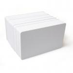 The photo shows a pack of 100 Dyestar blank white plastic cards with the brand name badge in bold black font at the top. Each card has a sleek, glossy finish and rounded corners. The cards are neatly stacked on top of each other, creating a professional and organized appearance.