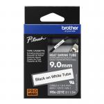 In the photo, two Brother laminated labels labeled as Brother HSE-221E are shown. The label is 9mm in size and has a black design with white text, specifically using the Heat Shrink Tube feature. The product code 33427J is visible on the label.