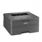 In the photo, the Brother HL-L2445DW Mono A4 Laser Printer is shown in sleek black with a compact design. The control panel is located on the top front, with a monochrome display screen and easy-to-use buttons. A paper tray can be seen at the bottom and the printers name is visible on the top.