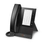 The photo shows three black HP Poly corded telephones. The main phone features a black and white display screen with clearly labeled buttons and a speakerphone. The two smaller phones have a minimalist design with a simple keypad and speaker. All three phones are perfect for a professional office setting.