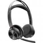 This photograph features the HP Poly Voyager Focus 2 Microsoft Teams Certified Stereo Headset with a USB-C to A adapter. The sleek, wireless design of these headphones is perfect for professional use and can easily connect to Microsoft Teams for seamless communication.