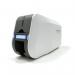 The IDP Name Badges IDP Smart 51 Plastic Card Printer (Single-Sided) presents a sleek and modern design with a slim profile. It features a clear LCD display for easy navigation and a sturdy, durable build. The printer produces high-quality, professional cards with ease and efficiency.