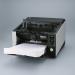 This picture features a sleek black Fujitsu scanner with the brand name prominently displayed. The RICOH fi-8930 model number is visible and it appears to be an A3 image scanner. The scanner has a professional design and looks high-tech with various buttons and a digital display.