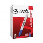 The image shows a pack of 12 blue Sharpie permanent markers, with bold Sharpie text on each marker. The markers have a fine point for precise writing and are neatly arranged in a row. The blue color is vibrant and stands out against the white packaging.